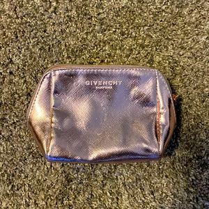 Givenchy cosmetic pouch in rose gold.
